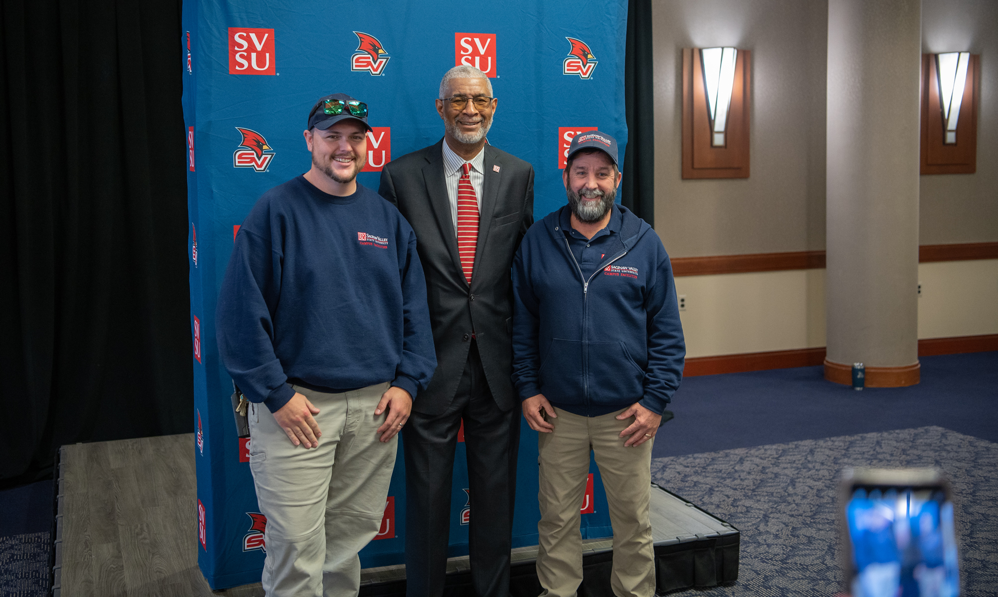 George Grant Jr. posing for a photo with two SVSU Faculty and Staff